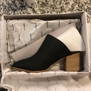 Report Women’s Theo black exotic mules size 10